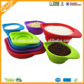 Shenzhen eco-friendly plegable medida de silicona tazas al por mayor